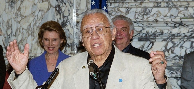 Billy Frank Jr. speaks in Olympia as former Governors Chris Gregoire and Mike Lowry stand behind him